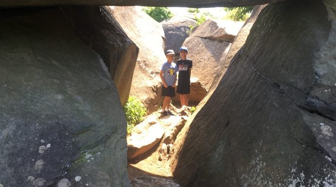 The boys' favorite place to visit is Devil's Den, where they can explore the rock formations and secret passageways and caves between them.