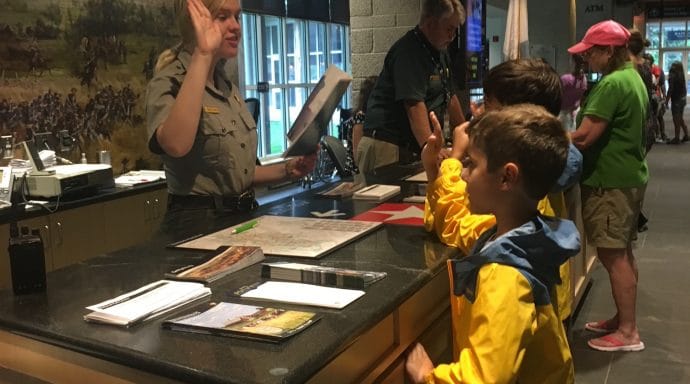 The boys taking their oath to protect national park lands.