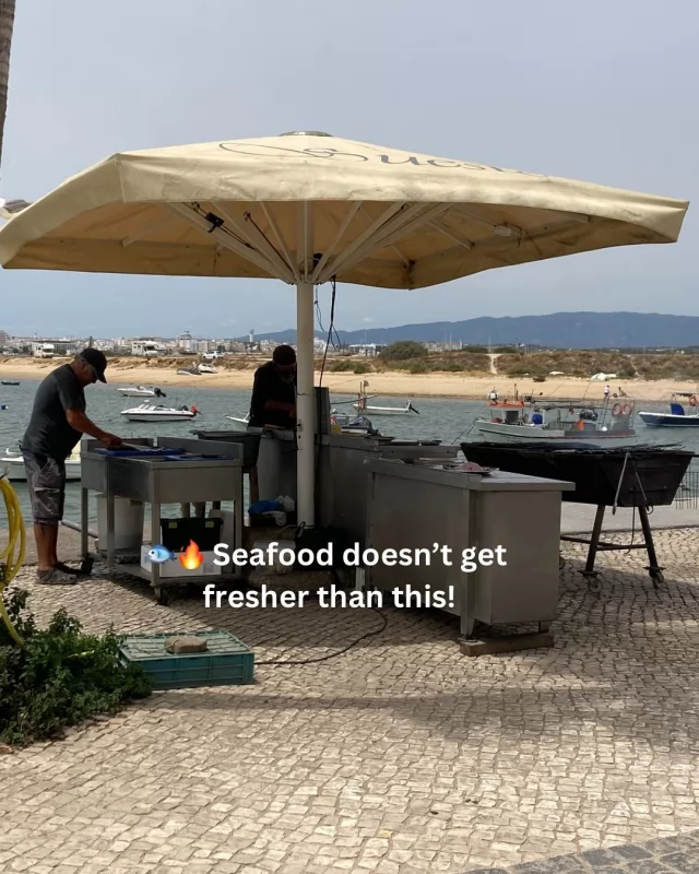🐟🔥 Seafood doesn’t get fresher than this—caught in the morning, grilled by the sea, and on your plate by lunch! Would you try it?  At Sueste Restaurant in Ferragudo, seafood is as fresh as it gets! 🦐🐠 Set right on the water’s edge, this spot is famous for its grilled fish, cooked outside over an open flame while you take in the harbor views. No frills, just unbelievably good seafood straight from the sea to your plate. 🌊🔥  If you love fresh seafood, this is a must-visit in the Algarve!  What’s your go-to order—grilled fish, shrimp, or something else? 🍽️👇  #AlgarveEats #SeafoodLovers #FerragudoFoodie #freshfromthesea