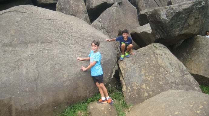 The boys' favorite place to visit is Devil's Den, where they can explore the rock formations and secret passageways and caves between them.